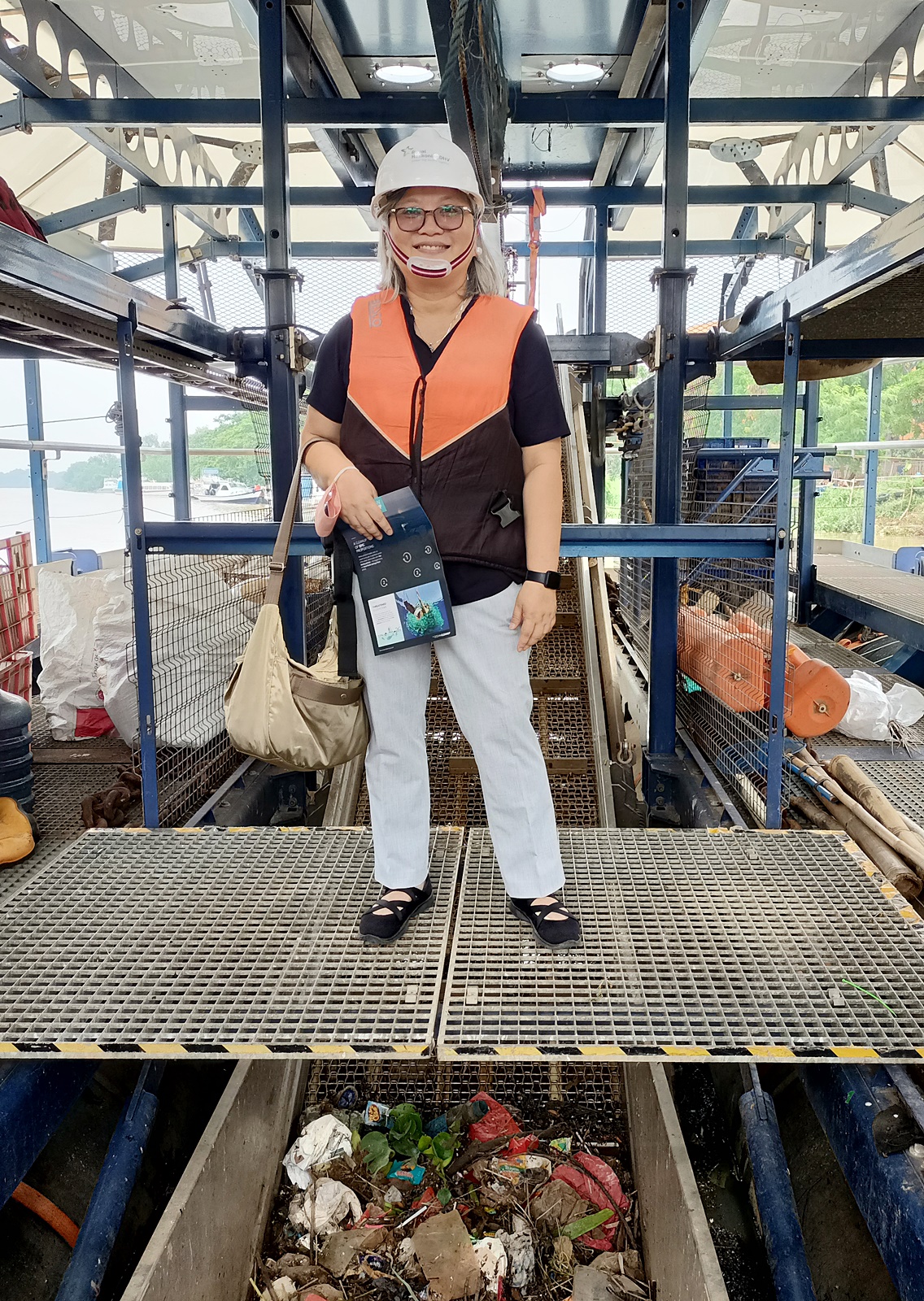 Prof Maria Antonia Tanchuling when visiting river cleanup system by The Ocean Clean Up